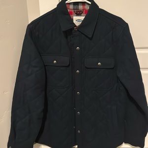Men’s jacket… jacket is dark blue with plaid interior. Super cool color scheme